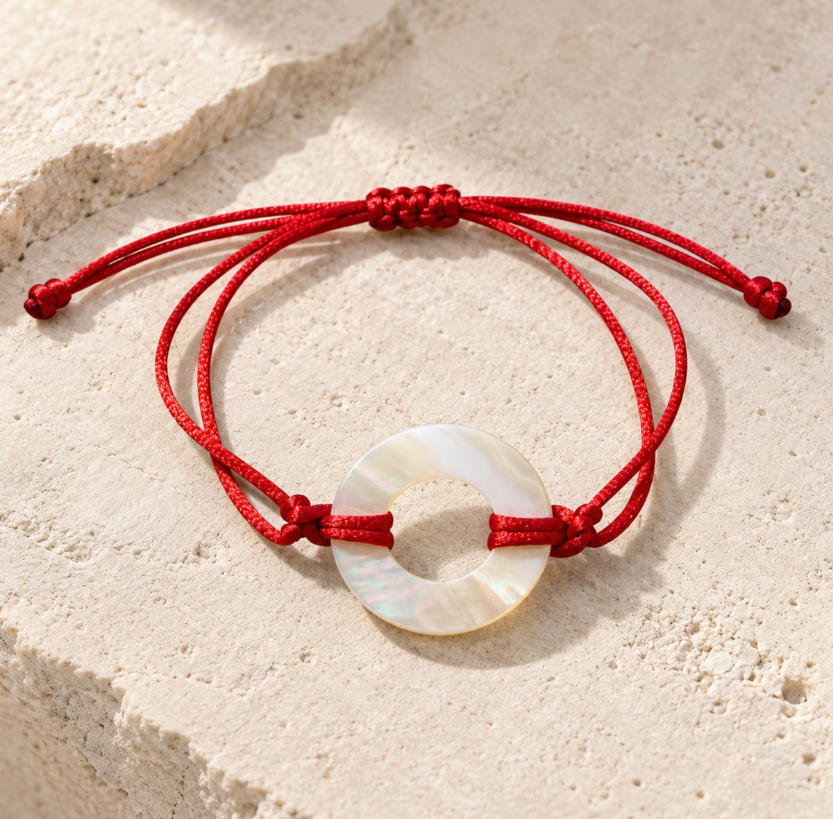 Pulsera de hilo con dije Madre Perla