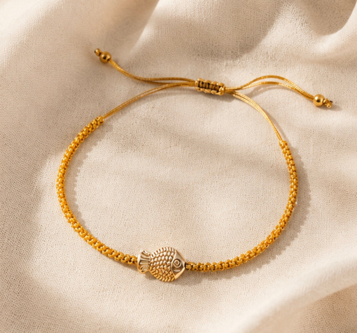 Pulsera Tejida con dije Pez